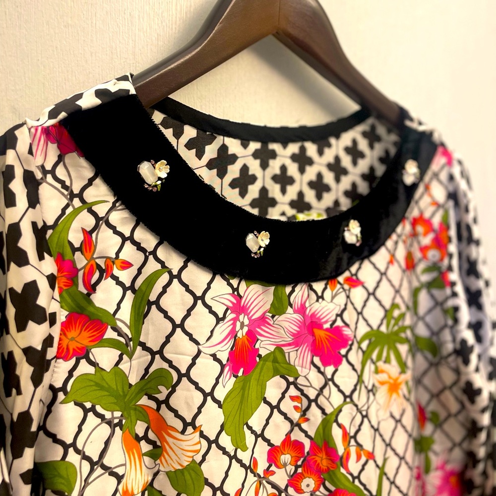 Never worn. Size medium